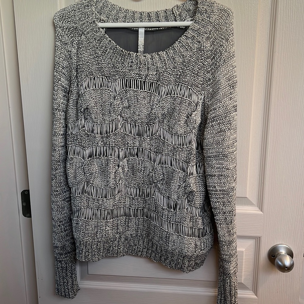 Knit sweater with sheer back